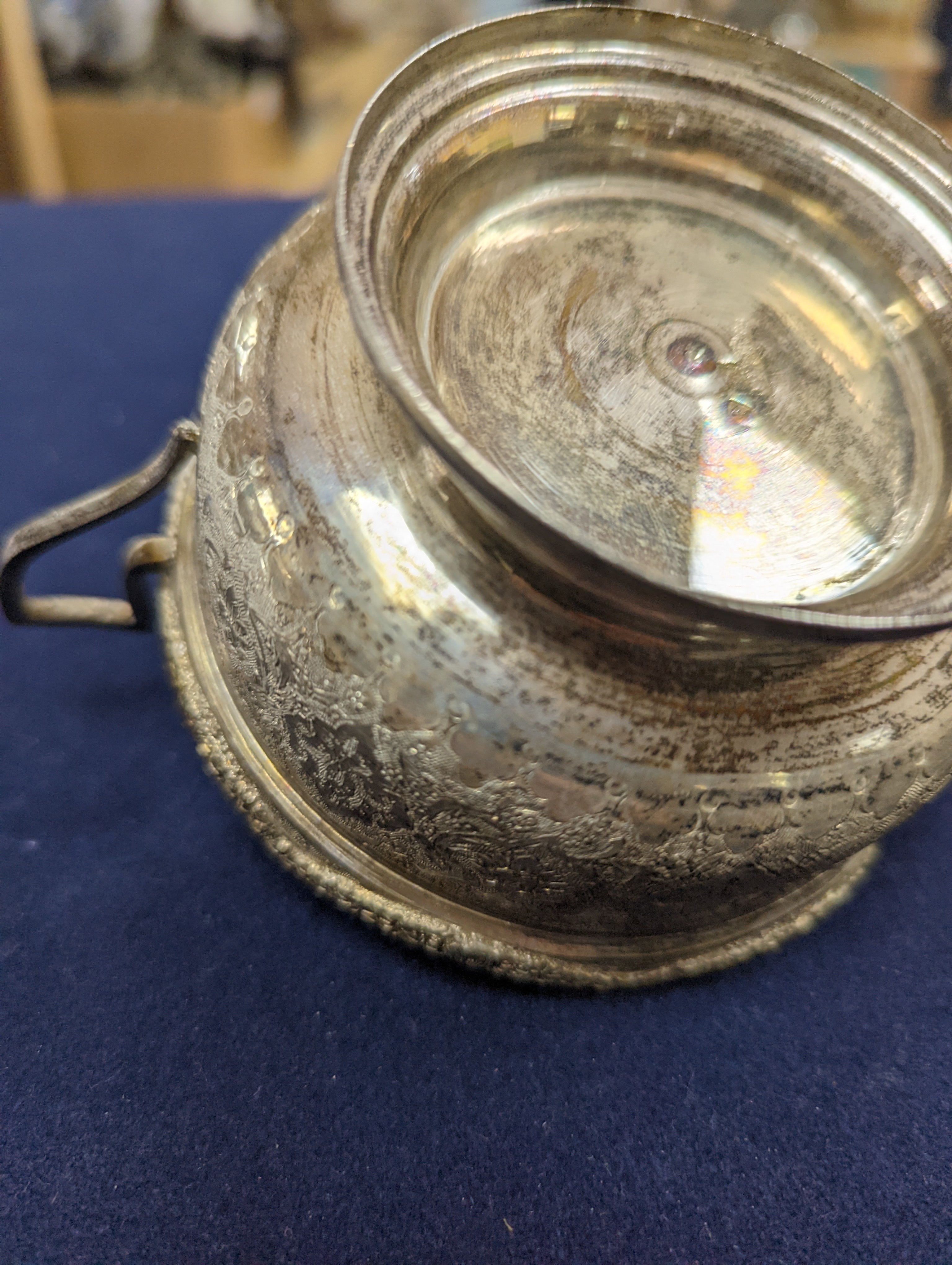 A set of six Persian embossed 84 standard white metal coffee cup holders and matching sugar bowl and cover by Vartan and four other Persian white metal items.
